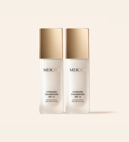 Two Meroda Changing Foundation SPF 15 bottles with gold caps from the 2 Bottles (+ Gifts) bundle.
